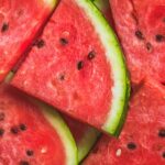 Sliced red ripe watermelon. Fruit background and texture