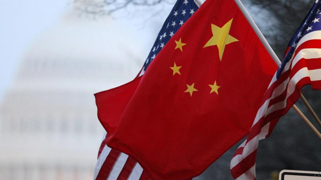 File photo of the People's Republic of China flag and the U.S. Stars and Stripes along Pennsylvania Avenue near the U.S. Capitol in Washington