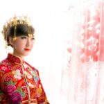 Beautiful bride in Chinese traditional wedding dress