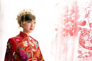 Beautiful bride in Chinese traditional wedding dress