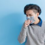 man is coughing