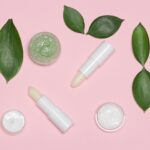 Natural lip skin care products with green leaves