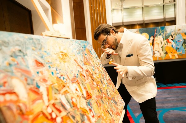 Giuseppe-Cassin-viewing-1-of-the-pieces-from-the-collection-for-auction