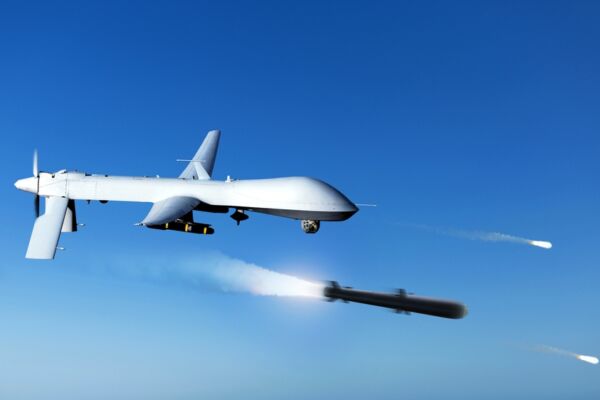 Combat,Drone,Flies,High,In,The,Sky,And,Shoots,Missiles,