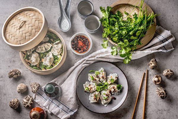 Asian,Food,Concept,With,Homemade,Dumplings,On,Plates,And,In