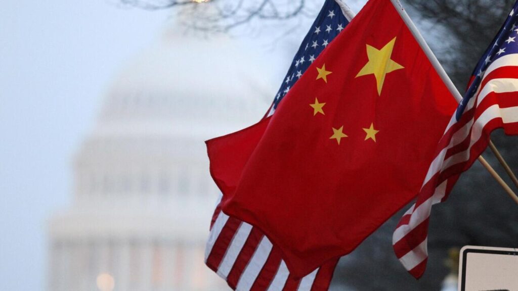 File photo of the People's Republic of China flag and the U.S. Stars and Stripes along Pennsylvania Avenue near the U.S. Capitol in Washington